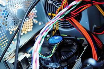 Close-up of Intel CPU cooler and colorful PC power cables