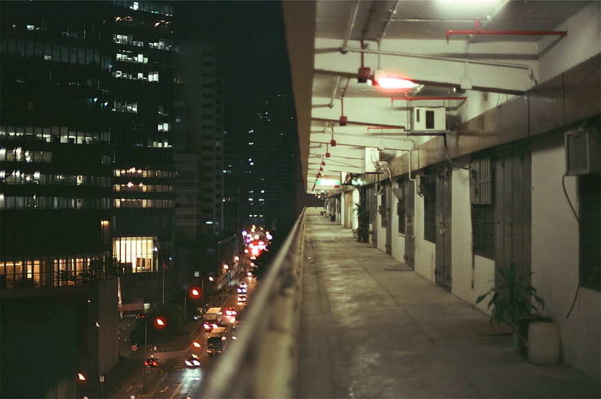 Night view of urban street from elevated walkway