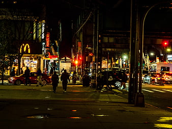 Nighttime Street Scene in Brooklyn with McDonald's and Traffic