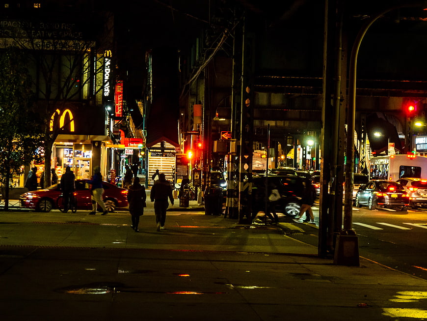 Nighttime Street Scene in Brooklyn with McDonald's and Traffic