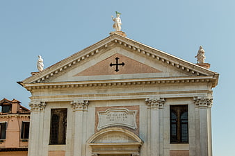 Classical Church Facade with Pediment and Statues in Venice