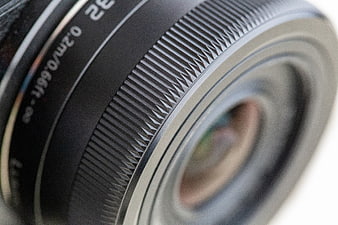 Close-up of Camera Lens Focus Ring and Glass Element