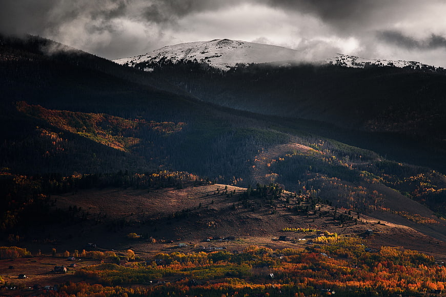 Dramatic Autumn Mountain Landscape with Snow-Capped Peak