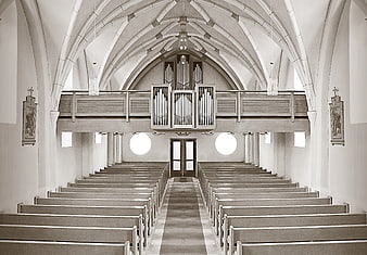 Symmetrical Black and White Church Interior with Organ