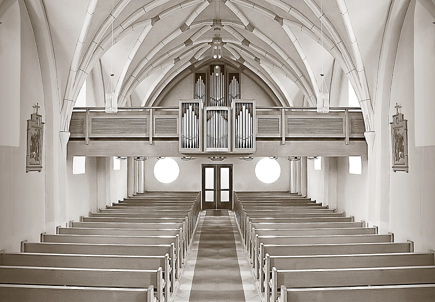Symmetrical Black and White Church Interior with Organ