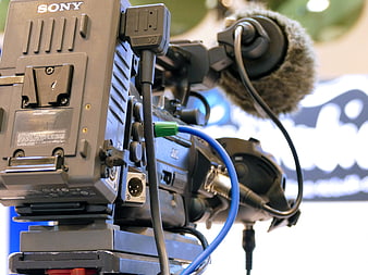 Close-up of professional Sony broadcast video camera with microphone