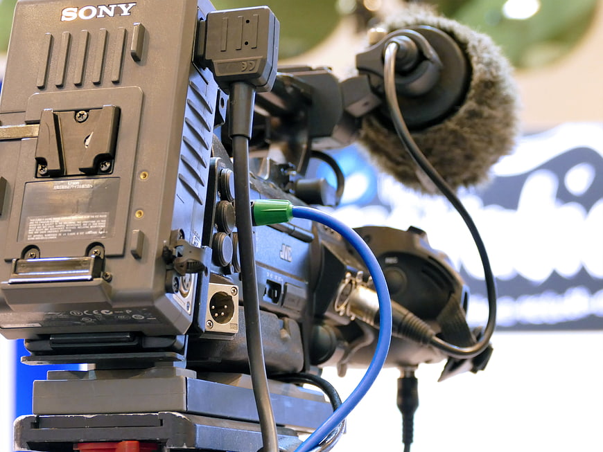 Close-up of professional Sony broadcast video camera with microphone
