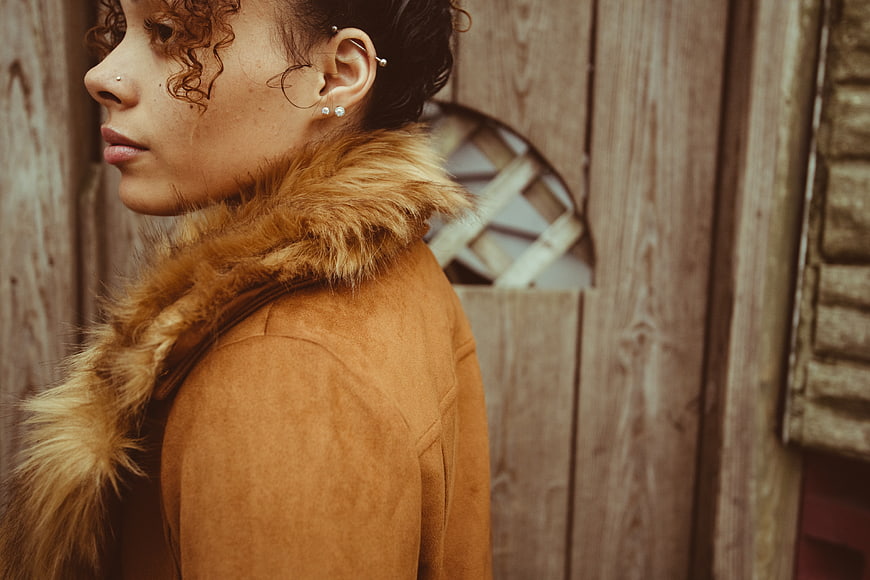 Profile Portrait of Woman in Brown Fur Coat