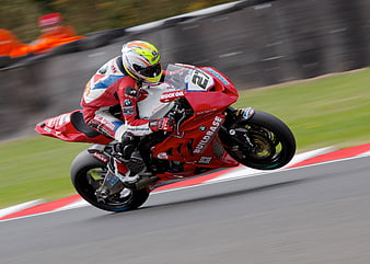 Red BMW Superbike Racing on Track