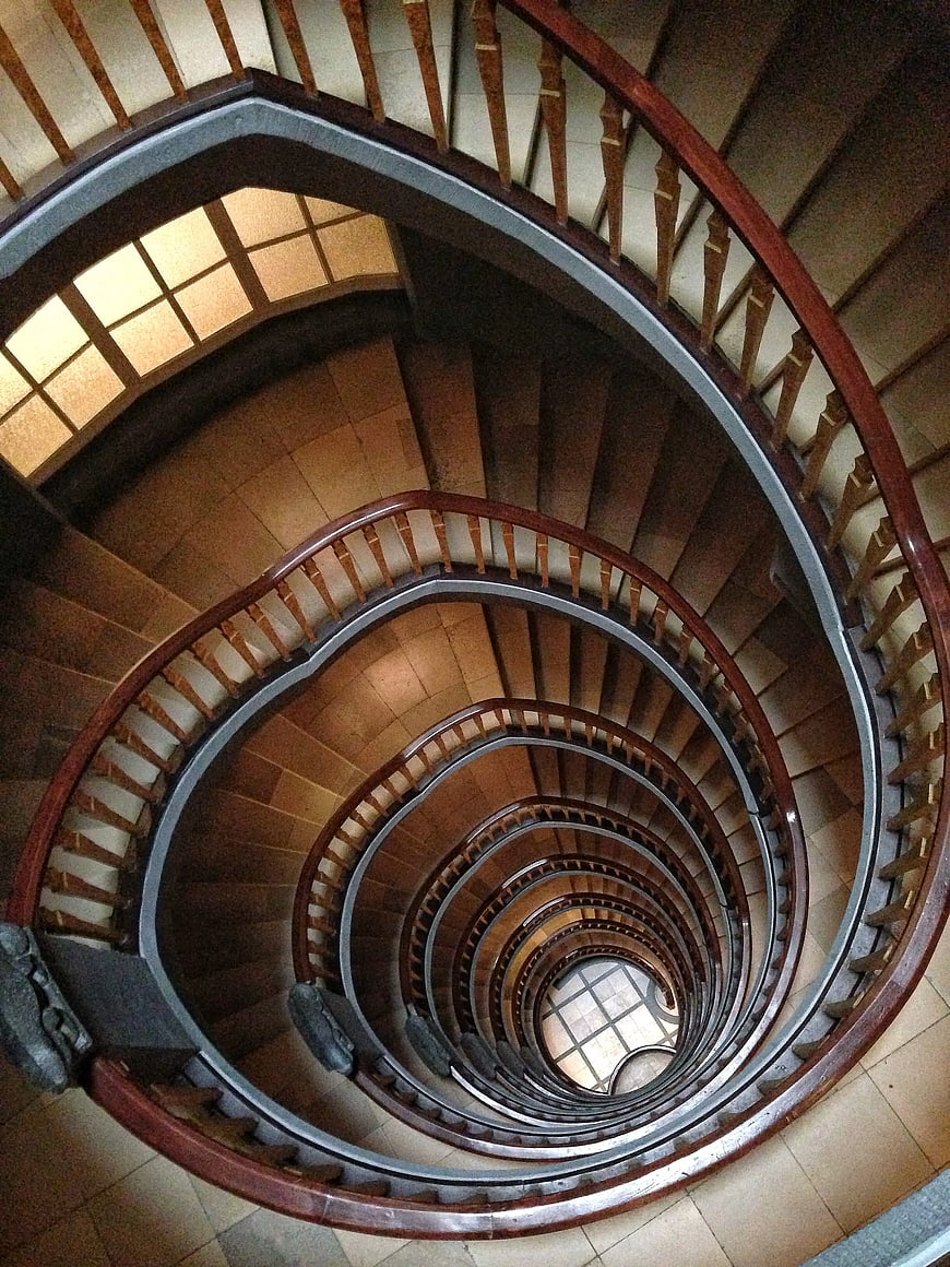 Top-down view of a wooden spiral staircase