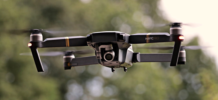 DJI Mavic Pro Drone Flying in Mid-Air