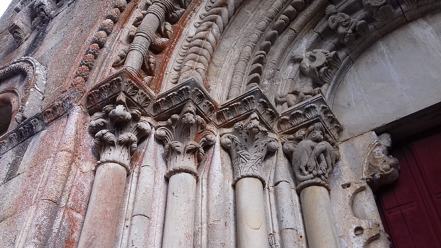 Romanesque church portal with carved stone capitals