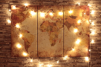 Vintage World Map on Brick Wall with Fairy Lights