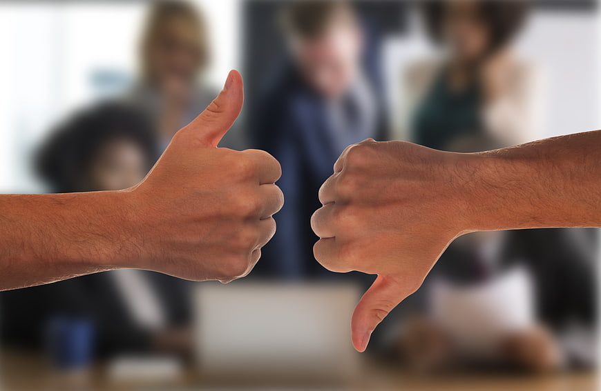 Thumbs Up And Thumbs Down Hand Gestures In Office