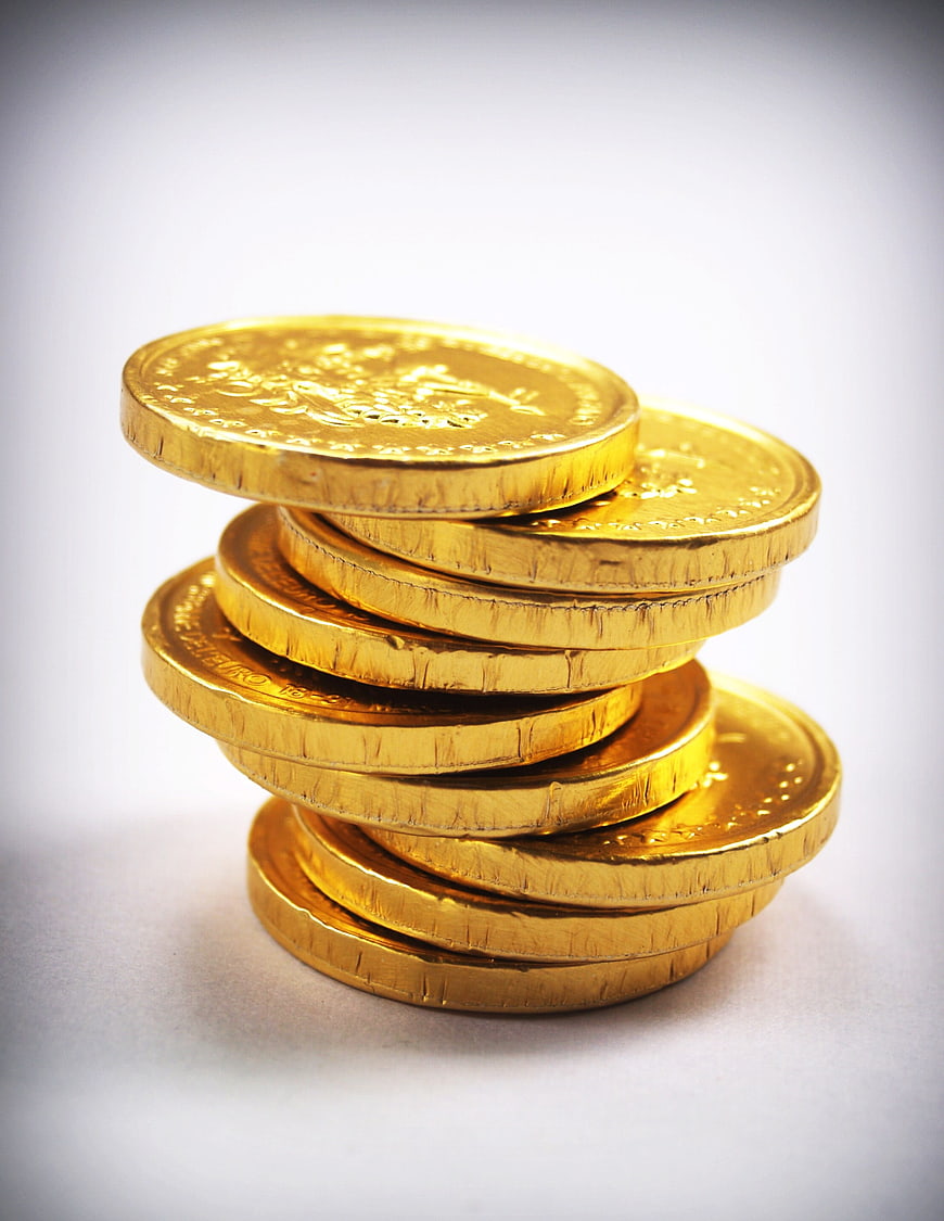 Stack of Gold Coins on White Background