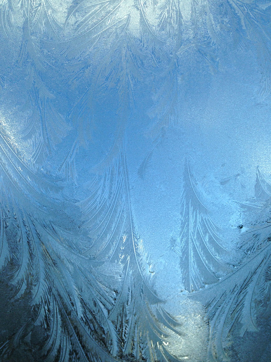 Frost Patterns on Blue Tinted Glass Window Texture