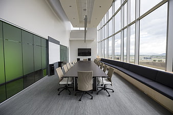 Modern Conference Room With Floor-To-Ceiling Windows And Long Table