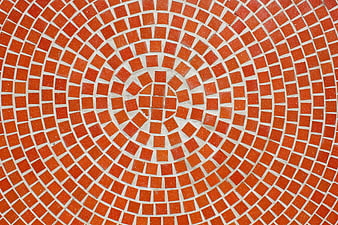 Red circular mosaic tile pattern background texture