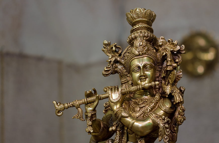 Golden Lord Krishna Statue Playing Flute