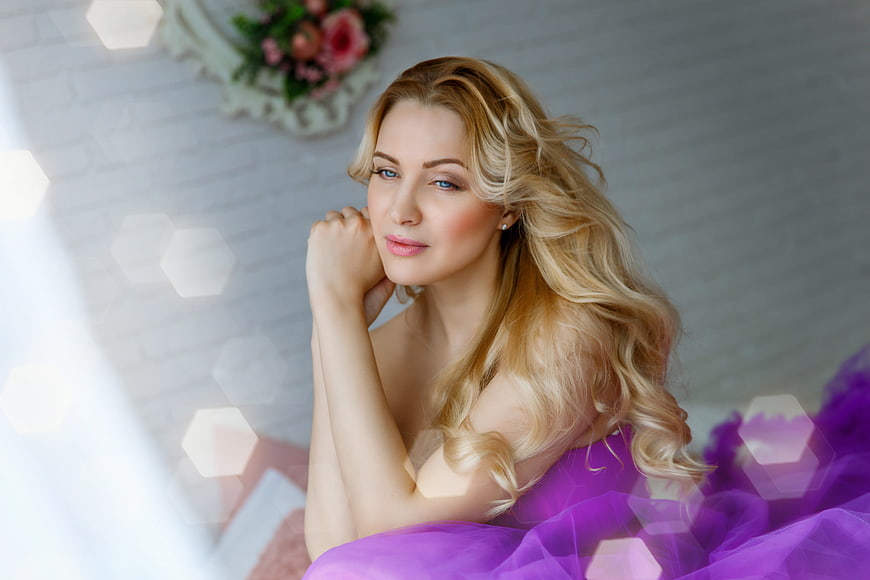 Beautiful Blonde Woman in Purple Dress Portrait