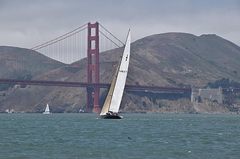 Sailboat sailing in front of Golden Gate Bridge San Francisco
