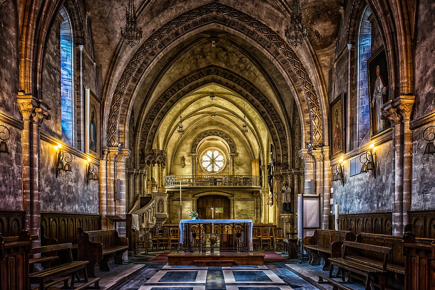 Interior of Gothic Church with Arched Ceiling and Altar