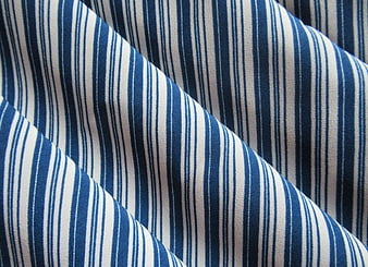 Close-up of blue and white striped fabric texture