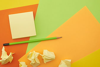 Colorful Flat Lay of Stationery and Crumpled Paper
