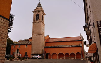 Orange Church Bell Tower in Italian Town Square