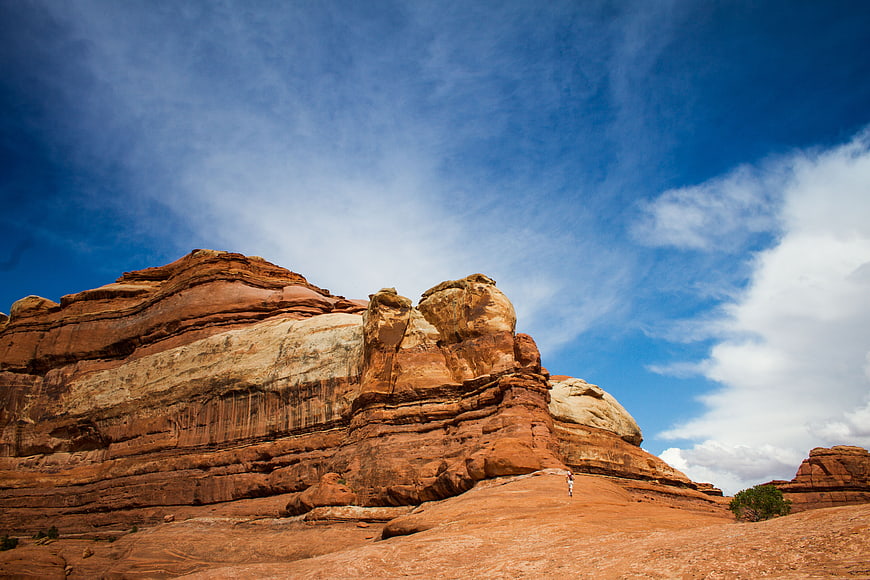 Red Rock Desert Landscape with Blue Sky and Clouds
