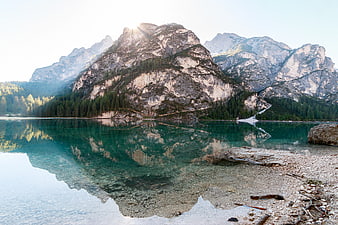 Crystal Clear Alpine Lake with Mountain Reflections