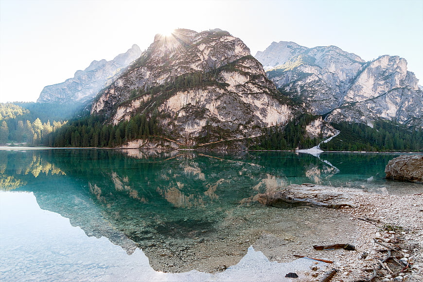 Crystal Clear Alpine Lake with Mountain Reflections