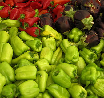 Fresh Green, Red Peppers and Eggplants at Market Stall