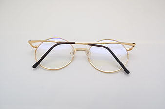 Gold Round Eyeglasses on White Background