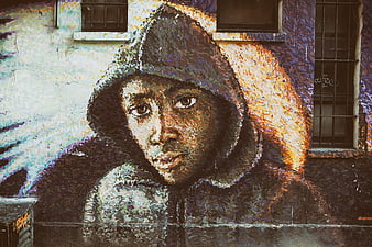Street Art Portrait of Hooded Figure on Urban Wall