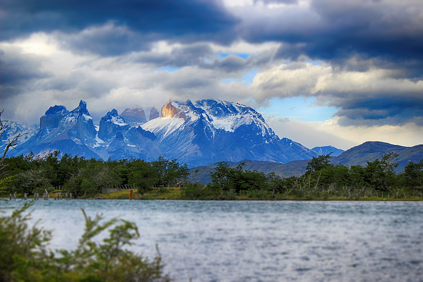 Dramatic Torres del Paine Mountains with Lake and Clouds