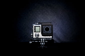 GoPro Hero4 action camera on dark background