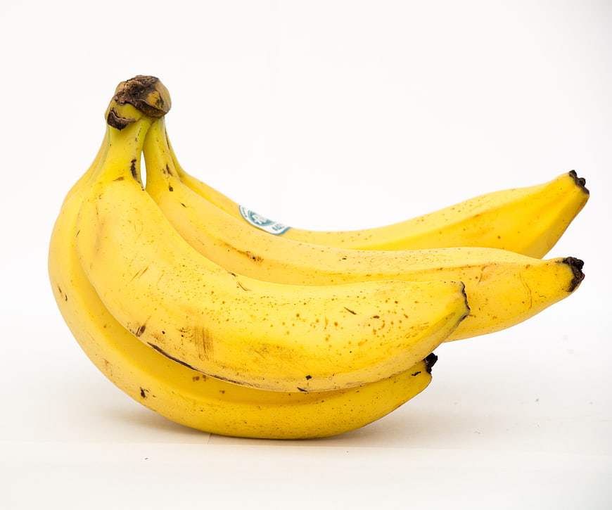 Bunch of Ripe Yellow Bananas Isolated on White Background