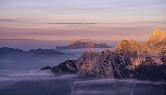 Majestic Mountain Peaks at Sunrise with Sea of Fog