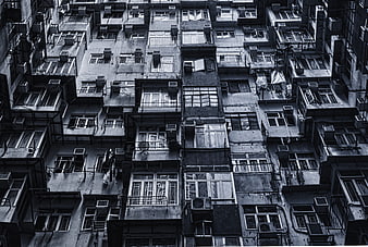 Dense Urban Housing Facade With Windows And Air Conditioners