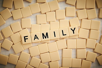 Scrabble Tiles Spelling Family on Game Board