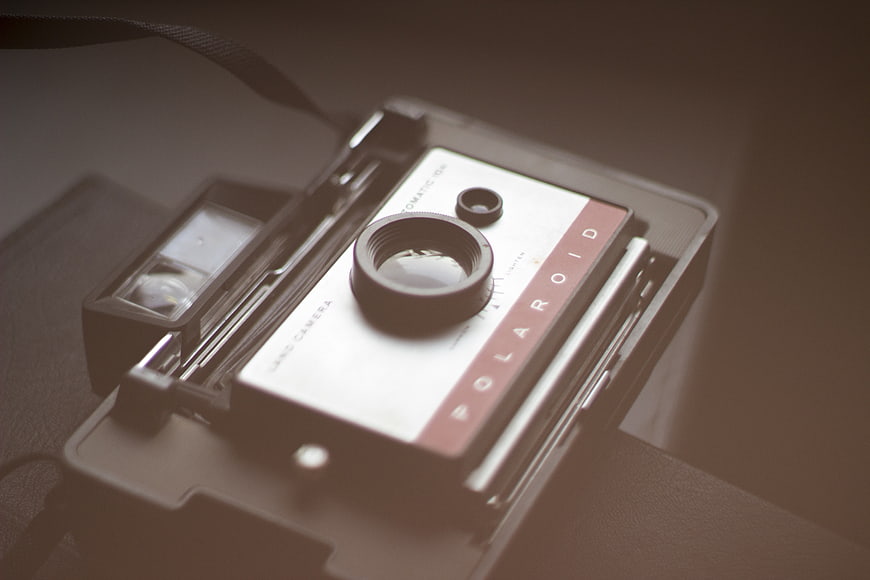 Vintage Polaroid Camera Close-Up with Nostalgic Mood