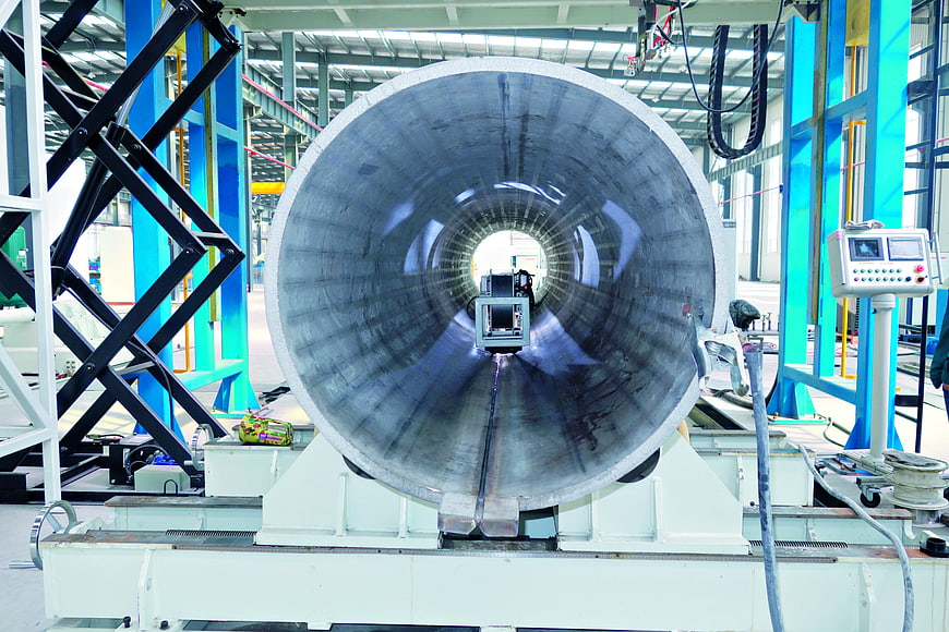 Large stainless steel pipe manufacturing in industrial factory