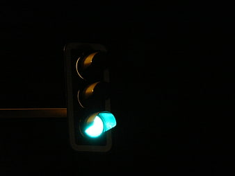 Green Traffic Light Signal at Night