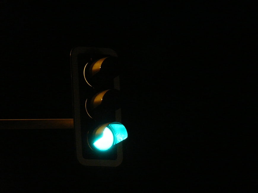 Green Traffic Light Signal at Night