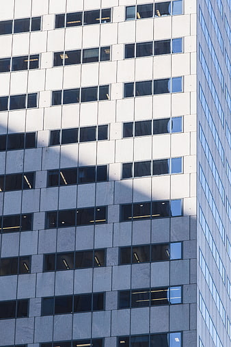 Modern Office Building Facade with Geometric Window Pattern
