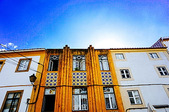 Colorful Portuguese Building with Blue Tiles and Blue Sky