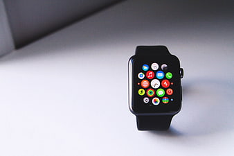 Black Smart Watch on White Surface