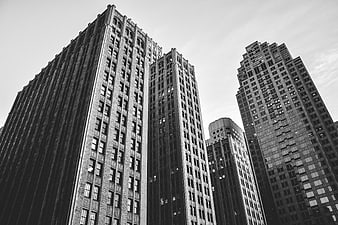 Black and white low angle view of city skyscrapers