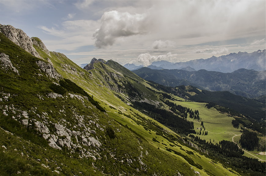 Panoramic Alpine Mountain Landscape with Green Valleys